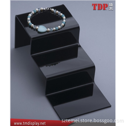 black layer acrylic riser jewelry display stand